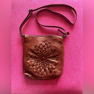Elegant Brown Crossbody Bag with Intricate Design